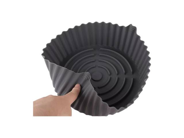 Bandeja Redonda de Silicona Comet de 23x8cm es una herramienta versátil y práctica para tu cocina.  Su material resistente, diseño funcional y facilidad de limpieza la convierten en una buena opción para diversas tareas culinarias.