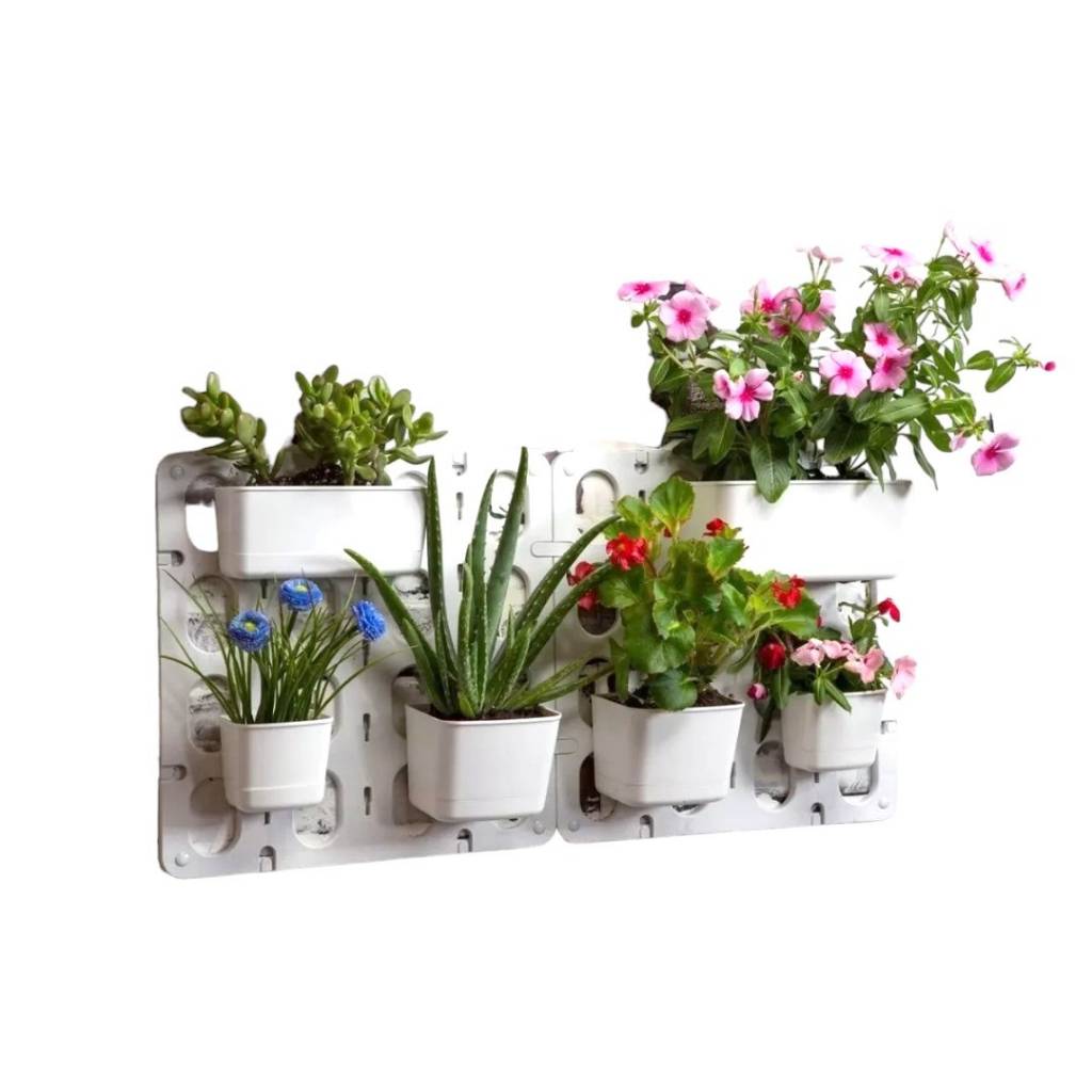 Cultiva un jardín  vertical en tu hogar con el Kit 6 Macetas Jardín Vertical Modular de Pared Vertibloom Interior. Incluye 6 macetas, sistema de montaje modular y diseño elegante. Ideal para hierbas, flores y plantas pequeñas. 